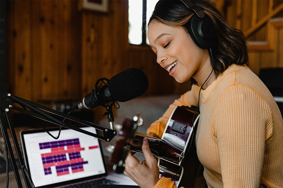 Musician recording a song