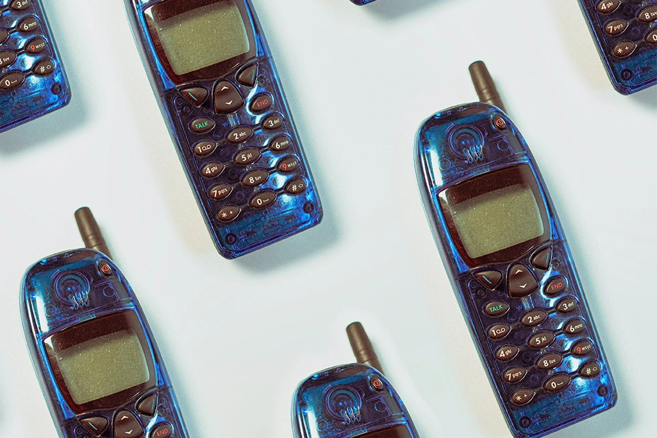 A bunch of glittery Nokia phones on a white background