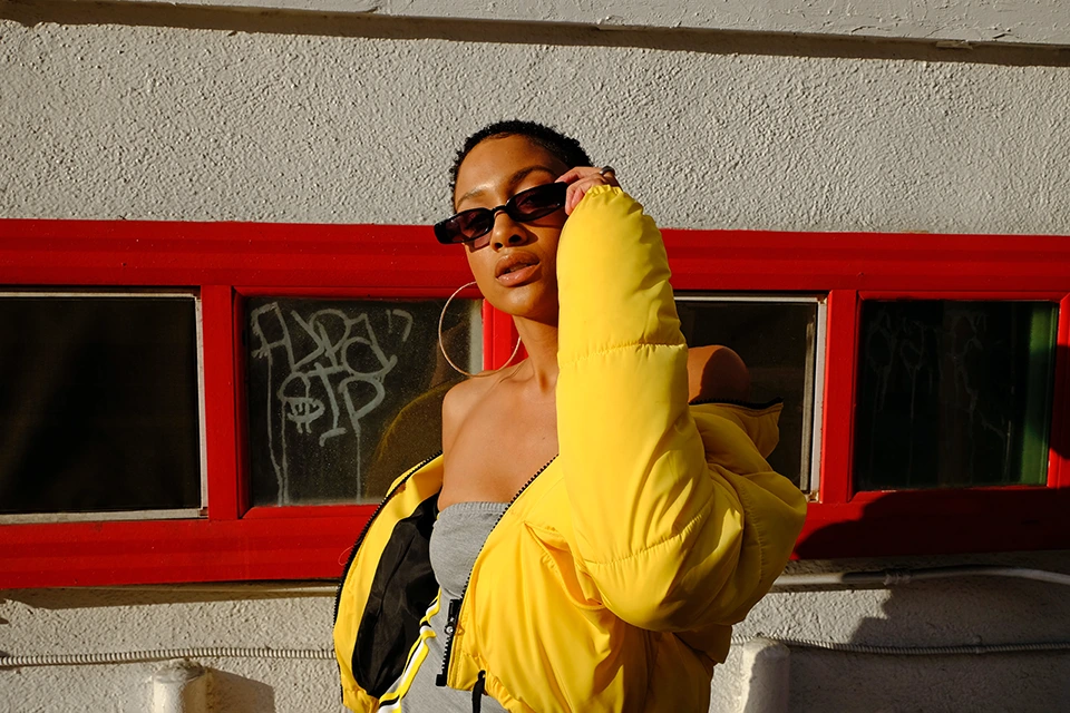 Influencer posing with sunglasses