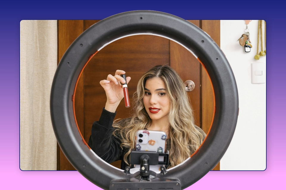 An influencer recording a video about makeup demonstrating influencer marketing ROI potential