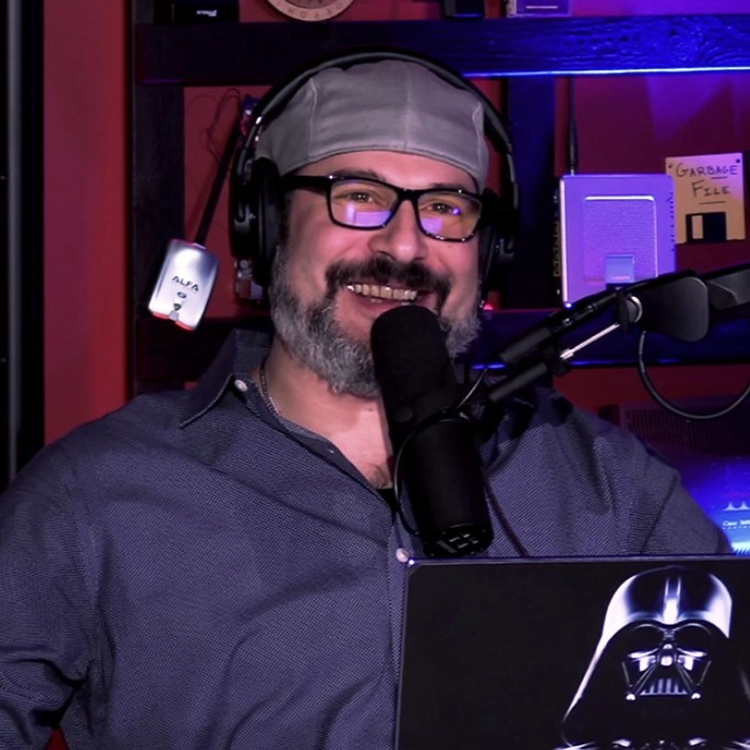 Paul Asadoorian talking into a mic