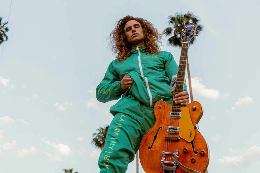 man holding a guitar